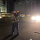 A police officer stands at a crossing following a blackout after a strong earthquake hit Sapporo.